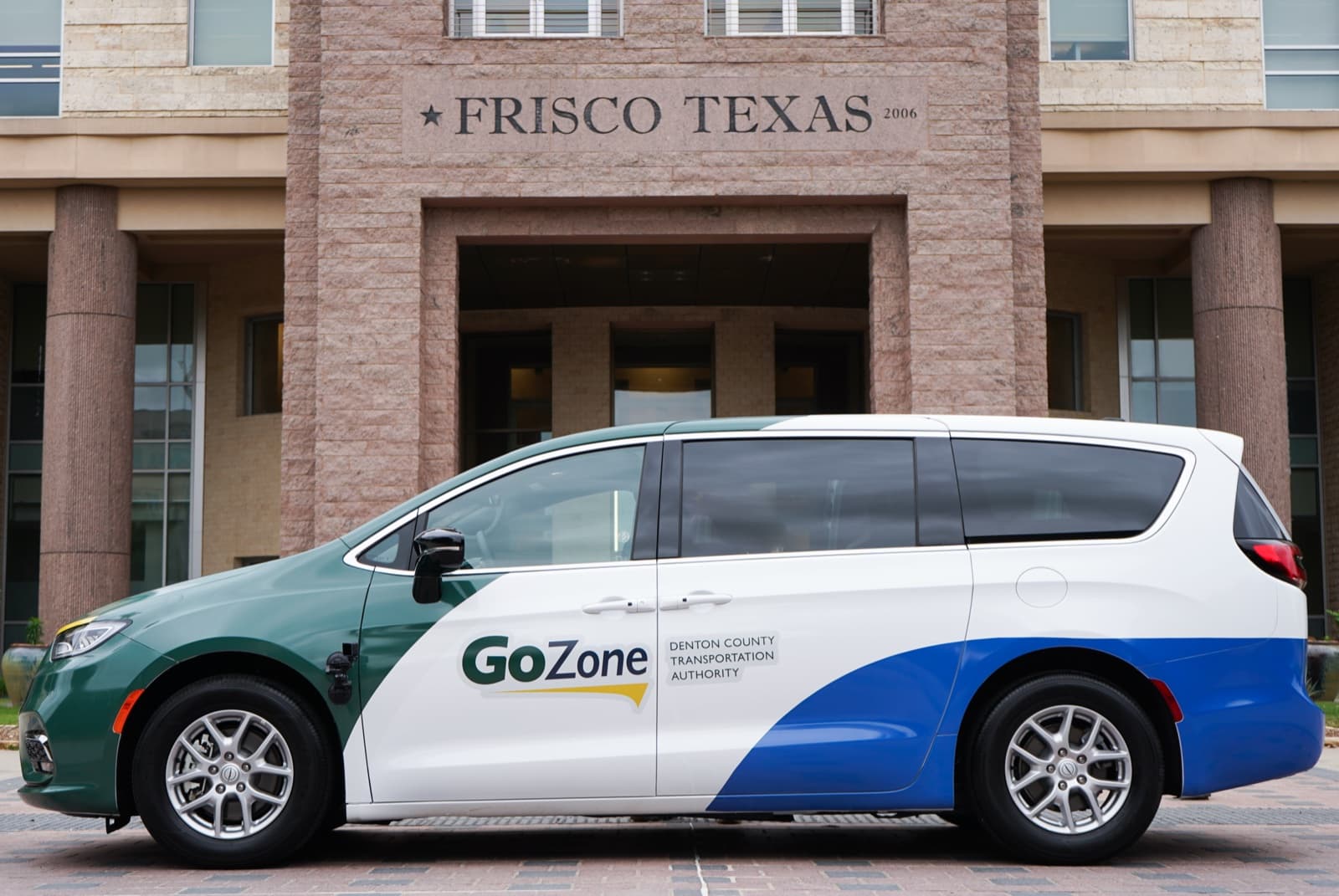 A GoZone van parked in front of Frisco City Hall